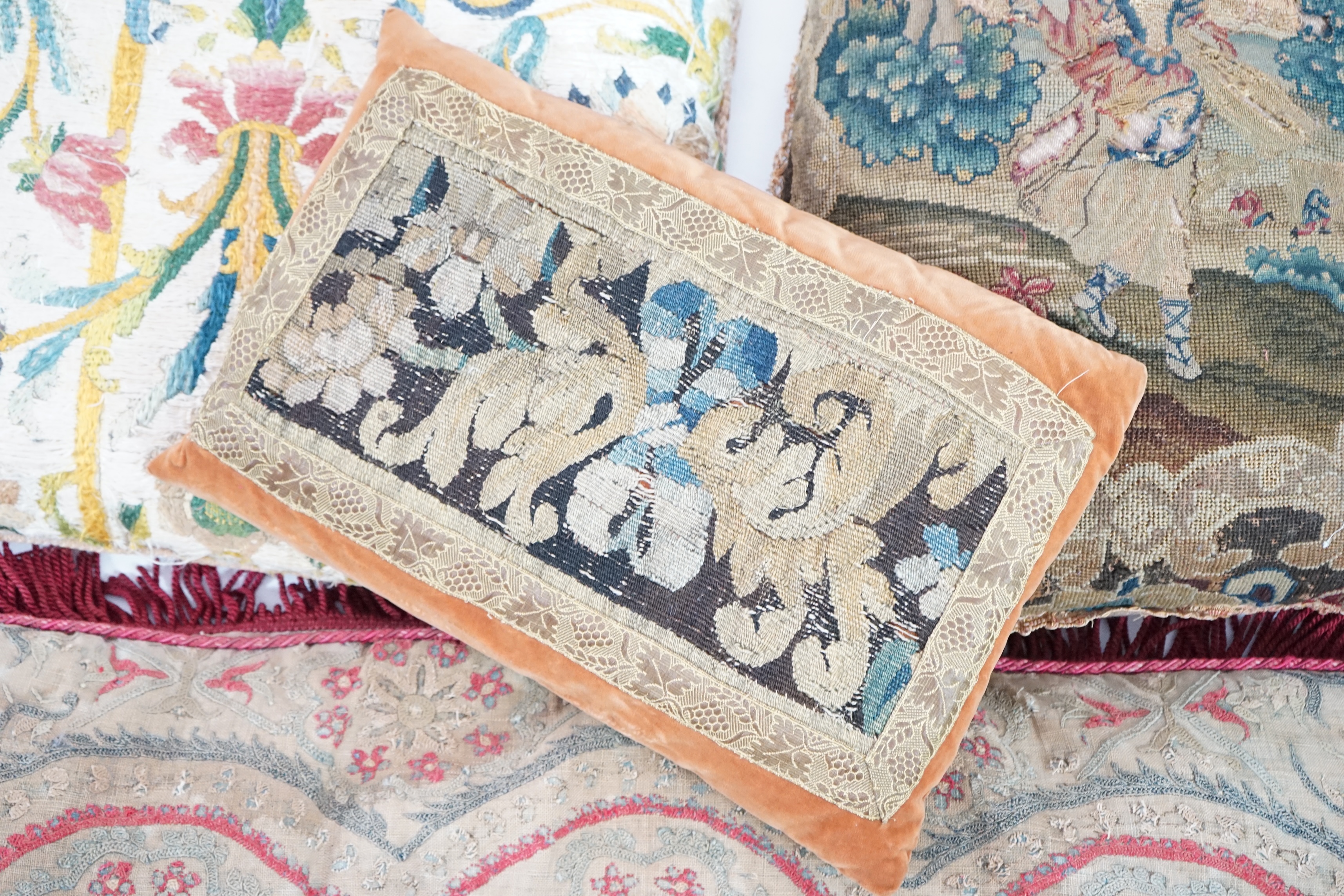 Four various fragments from the 18th and 19th century made into cushions